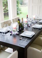 Contemporary dining table set for Christmas meal