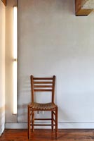 Wooden chair and strip light