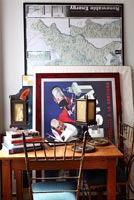 Wooden desk and vintage posters