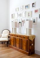 Wooden sideboard and photos display