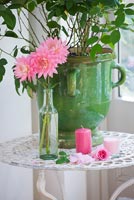 Vintage french urn and Dahlias in vintage bottle