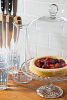 Fruit flan on glass cake stand
