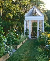 Country garden with raised beds and gazebo
