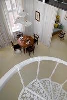 View of open plan apartment from staircase