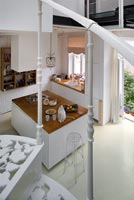 View of open plan kitchen from staircase