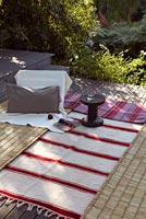 Rugs on decked patio