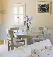 Grey wooden dining table and chairs