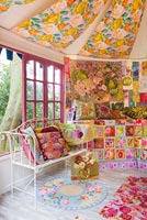 Inside of shed decorated by Kaffe Fassett with needlepoint designs at RHS Chelsea Flower Show 2012