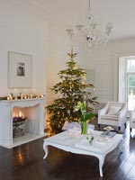 White living room decorated for christmas