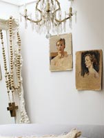 Portraits on white wall