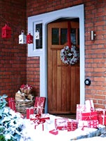 Front door with christmas presents