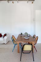 Modern dining table and colourful chairs