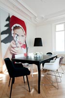 Contemporary dining room with 'Little Red Riding Hood Aiming Revolver' photo by Sandra Seckinger
