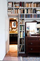 Bespoke bookshelves in bedroom