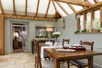 Dining area in wooden conservatory
