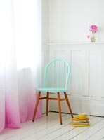 Pastel chair and dip dye curtain 