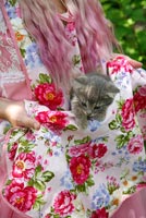 Woman holding kitten