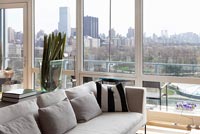 Modern living room with views over New York