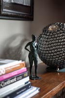 Bronze sculpture by owners mother and beaded lamp by Anthony Critchlow