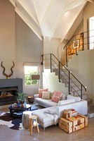 Contemporary open plan living room and staircase