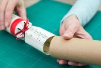 Step by Step guide for making Christmas Crackers from scratch - removing toilet roll