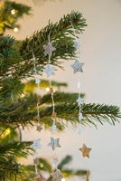 Creating a simple Christmas decoration using newspaper and string - finished decorations
