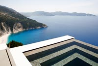 Modern pool overlooking sea