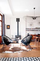 Black chairs in front of stove