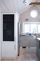 Kitchen unit with blackboard door