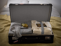 Woollen clothing in suitcase