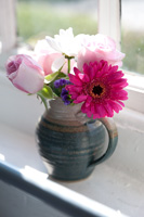 Posy of Roses and Gerberas in pottery jug