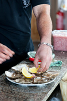 Preparing plate of oysters