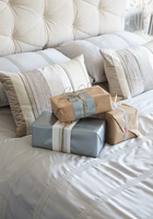 Christmas presents on bed