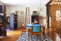 Colourful open pan house with vintage furniture
