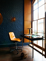 Leather chair and glass desk