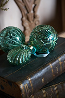 Green baubles and vintage books