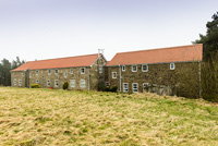 Stone house and field