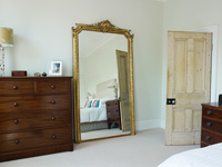 Large mirror in bedroom