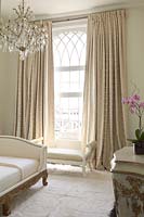Cream curtains in bedroom