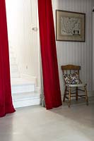 Red curtains in hall