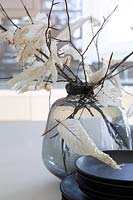 Foliage in glass vase