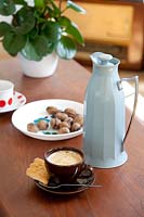 Coffee and biscuit on dining table