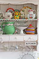 Vintage crockery on kitchen shelves