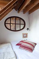Internal window above bed