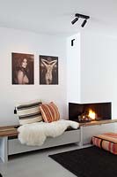 Built in storage and seating by fireplace
