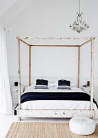 Rustic four poster bed
