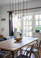 Pendant lights above dining table