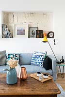Blue sofa with storage alcove above
