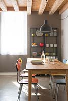 Wooden kitchen table and retro chairs