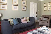 Grey sofa with patterned cushions